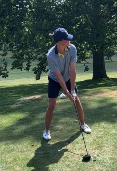 Riley Shaffer tees up for a shot.