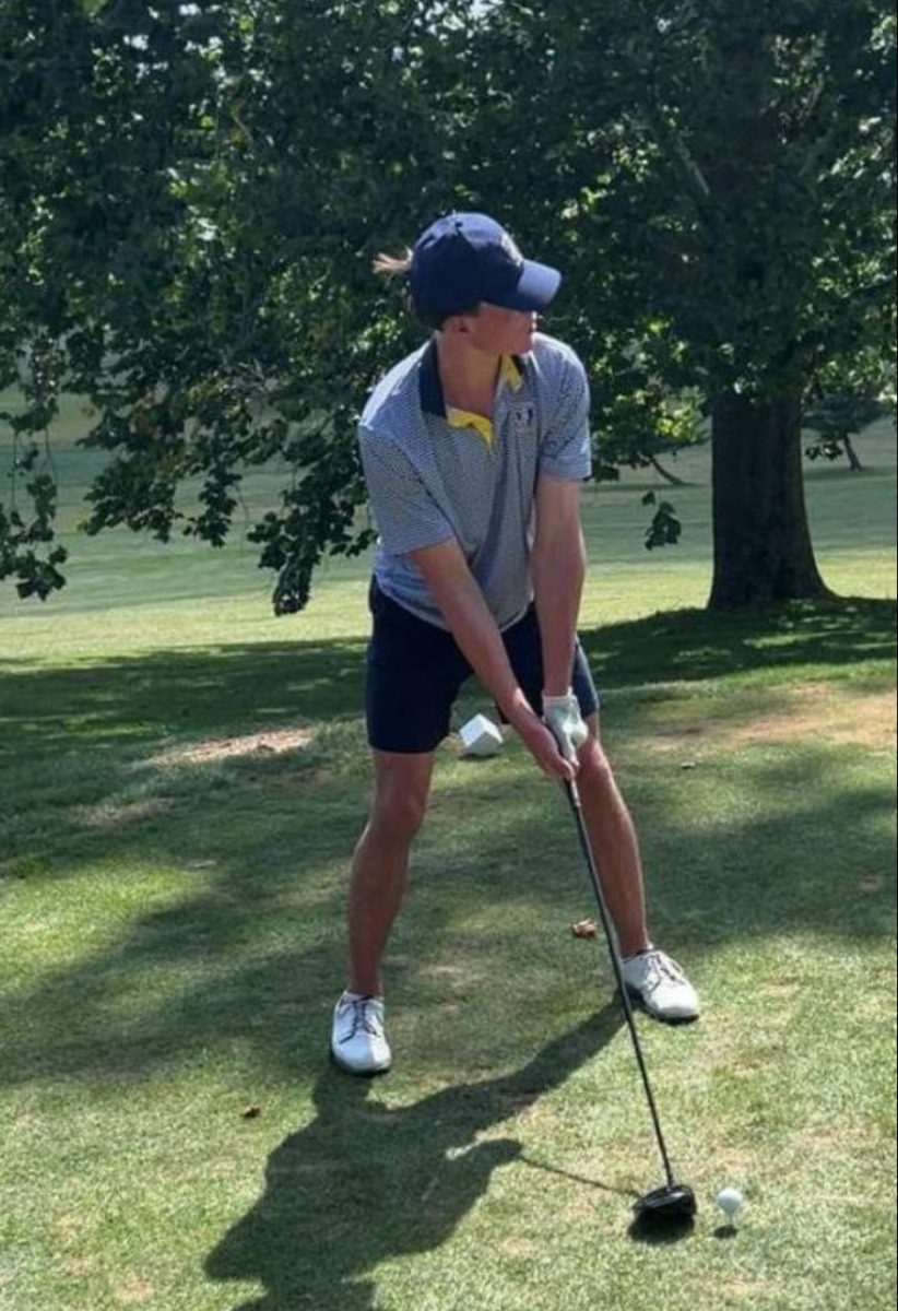 Riley Shaffer tees up for a shot.