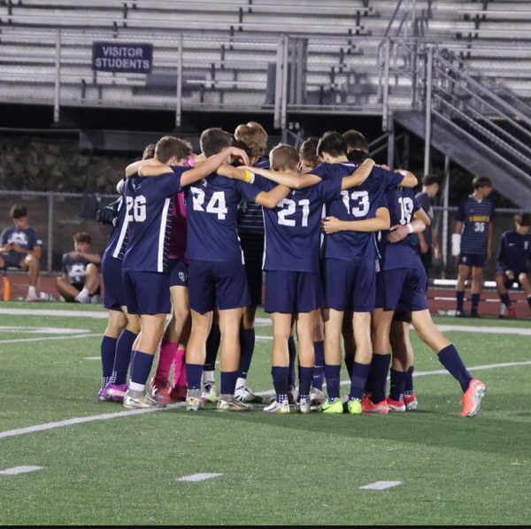 The Norwin boys have a pregame talk together on the field.