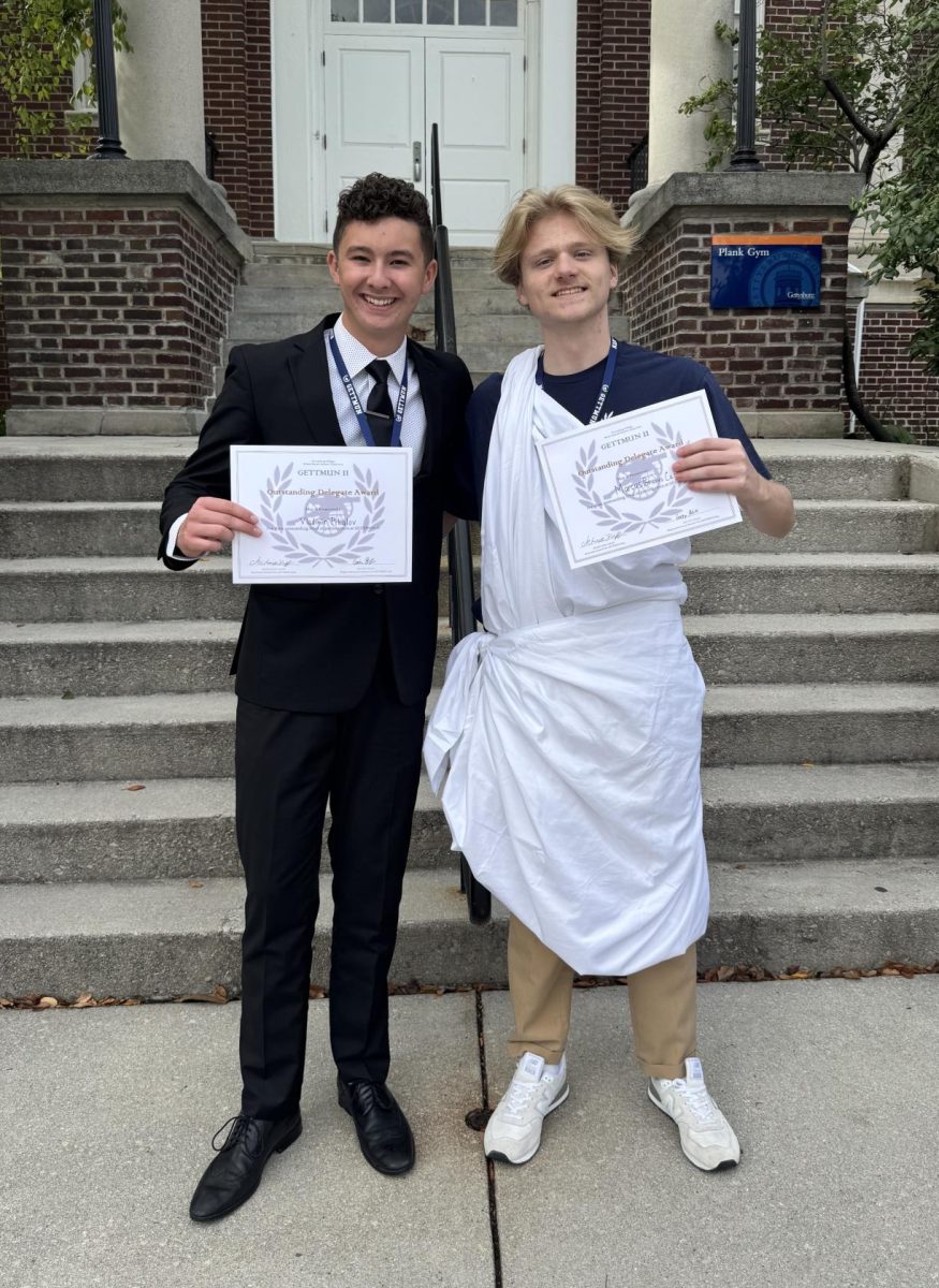 Juniors, Ola and Kunicky, pose with their awards.