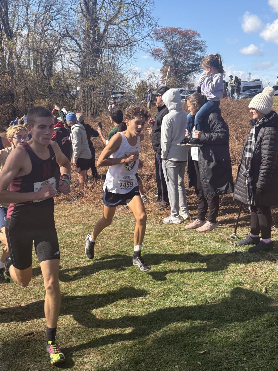 Freshman Ransom Gaydos running in the states championship in Hershey with a nose bleed after a kid elbow hit his face at the beginning of the race.
