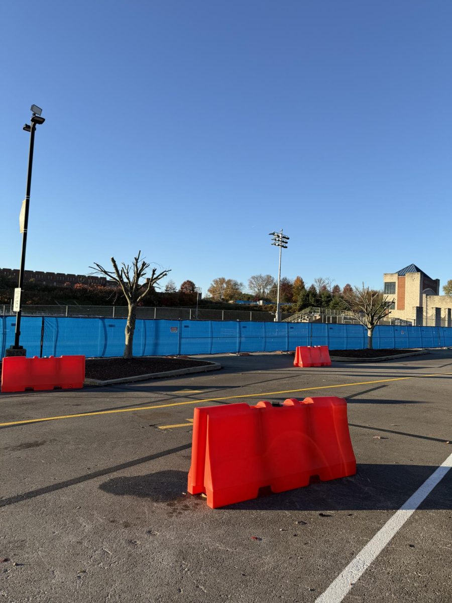Parking spots disrupted due to rerouting of the road in front of the stadium.