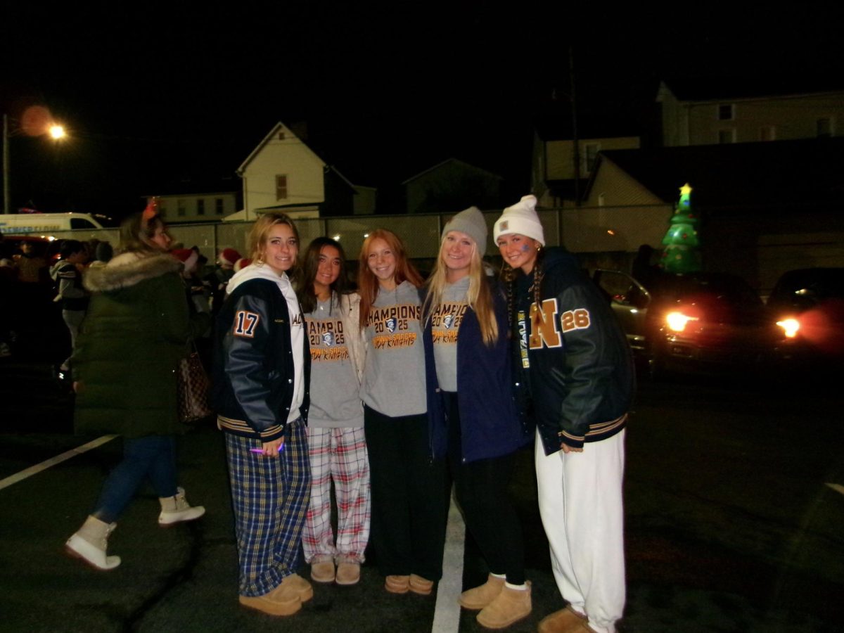 Some Norwin girls soccer players pose before the parade.