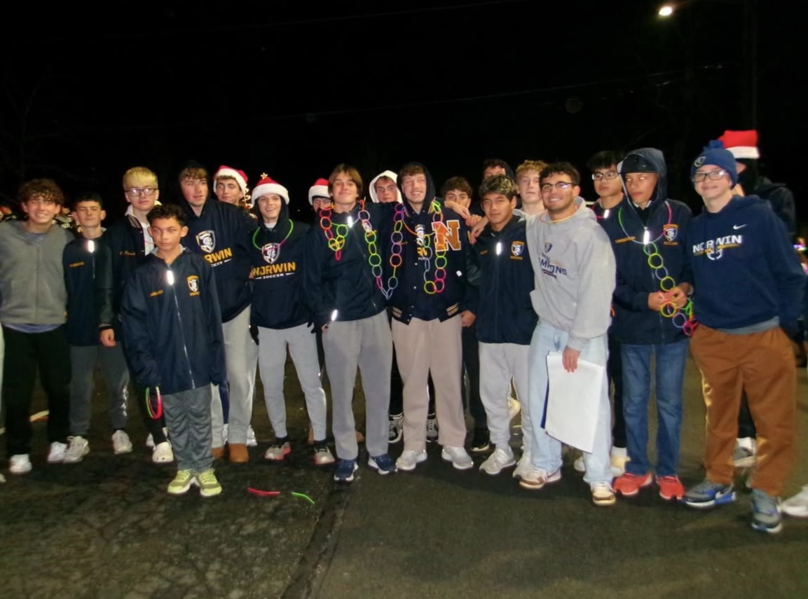 Norwin boys soccer team poses before the parade.