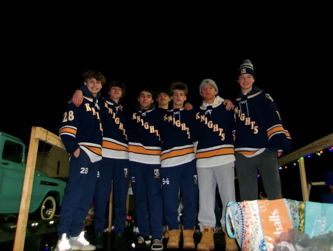 Norwin Hockey poses on their float before the parade.