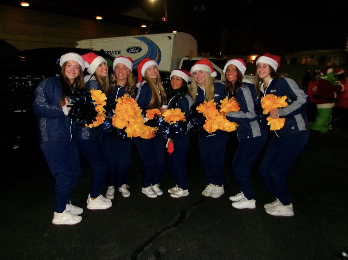 Some Norwin cheerleaders pose before the parade.