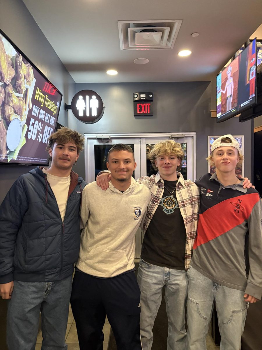 Michael at Buffalo Wild Wings with his friends Enzo, Nathan, and Kaden.