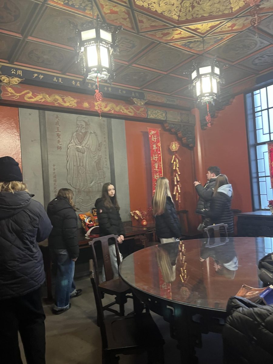 The students exploring the nationality room.
