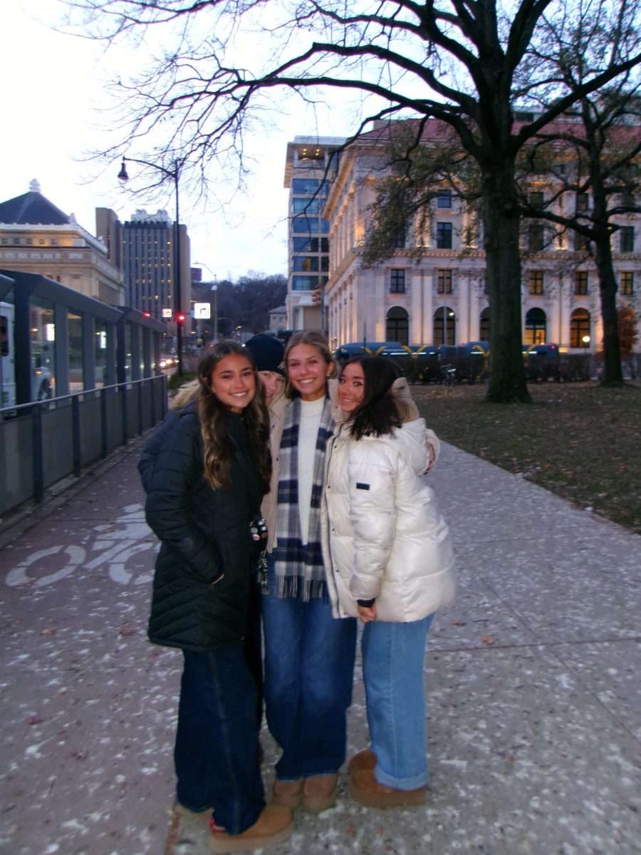Vanessa Halazynski, Vicki Marflak, Cassandra Halazynski, and Kalaina Phetsomphou pose outside the cathedral.
