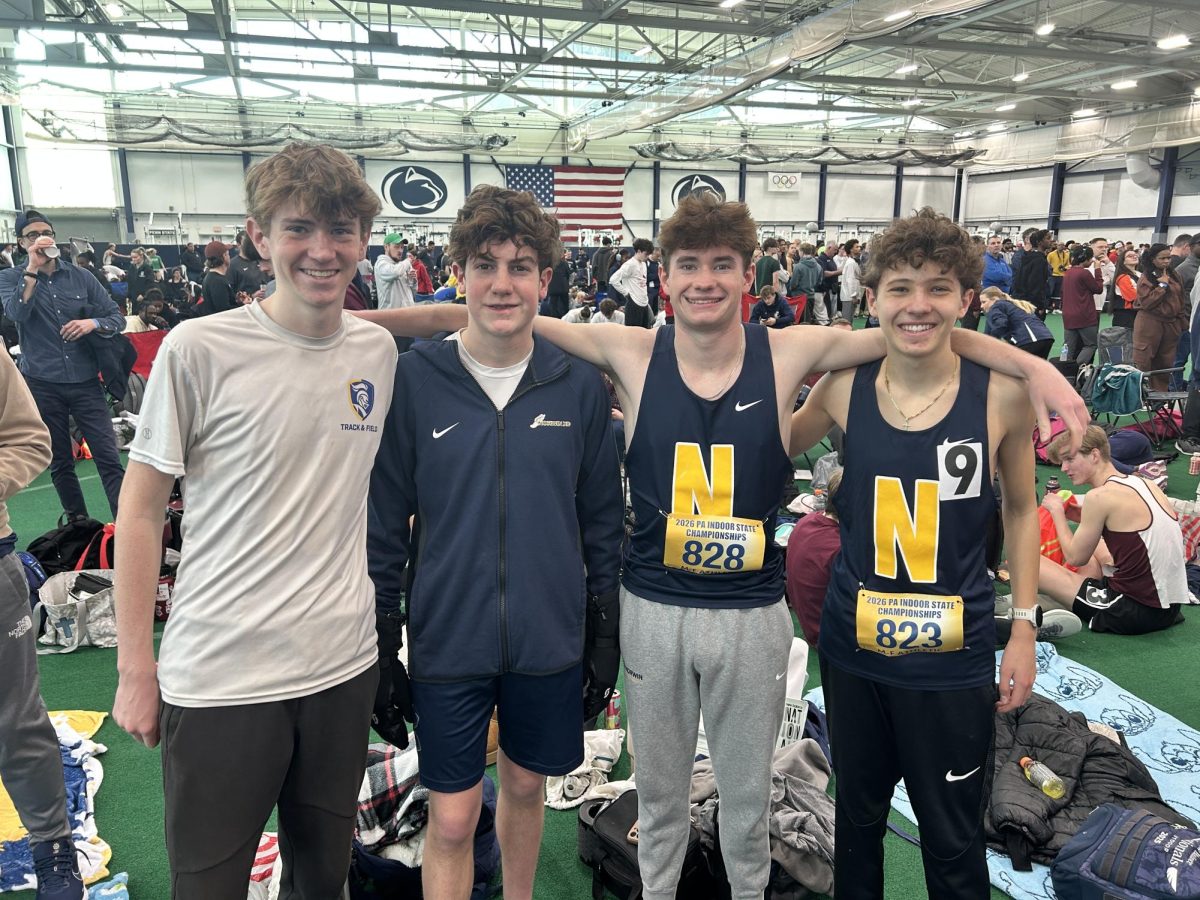 The Boys 4 x 800 young guns relay squad pose before their race at state championship. Freshmen Declan O'Donnell, sophomore Will Little, junior Owen Rankin, and freshmen Ransom Gaydos ran fast times for underclassmen all winter. 